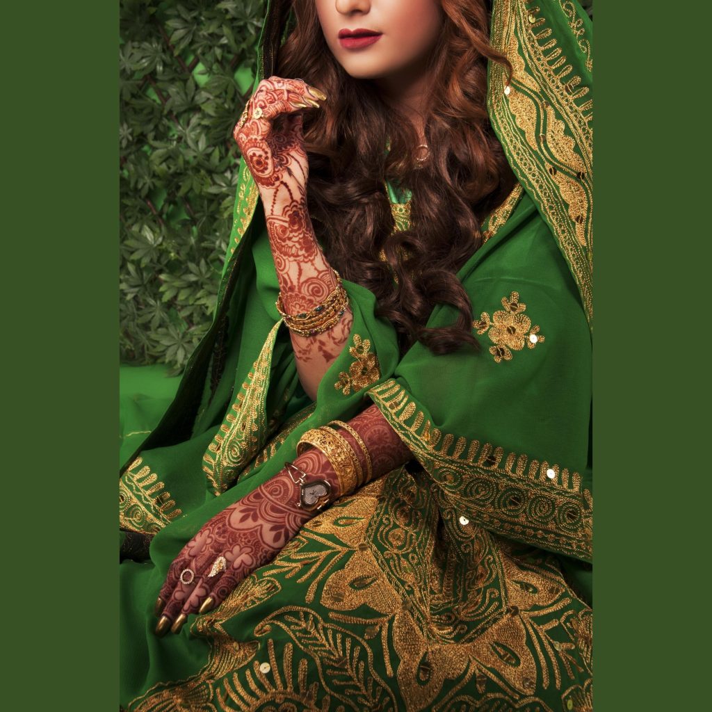 Simple Mehndi Design on the Hands of a Women